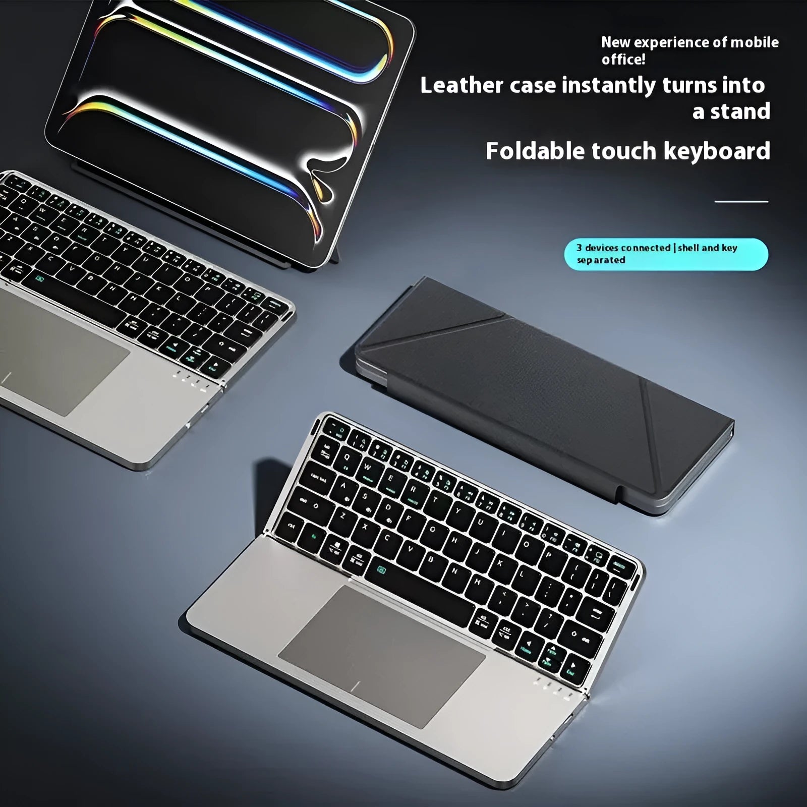 Grey Bluetooth folding keyboard unfolded next to mobile phone showing wireless connectivity for typing