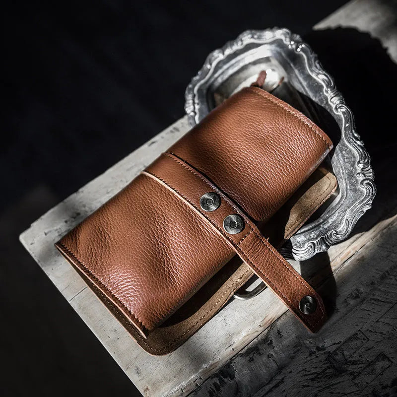 Handmade vintage style cow leather wallet with tape extraction closure in black colour