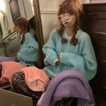 Women's loose fit retro pullover sweater in solid lake blue colour.