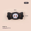 Small plush cat teaser toy with candy and skull designs in eyes or candy colours