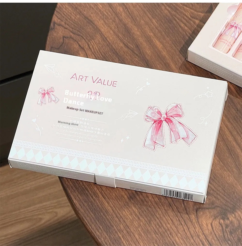 Butterfly box makeup set showing lip muds, powder blusher and necklace