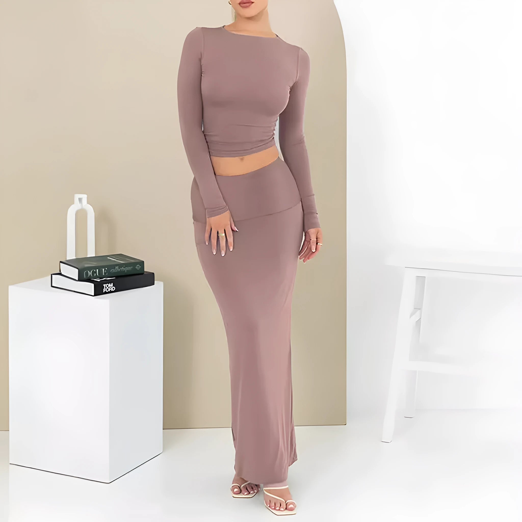 Women's sweet style two-piece suit set with long skirt and three-quarter sleeves in solid colour.
