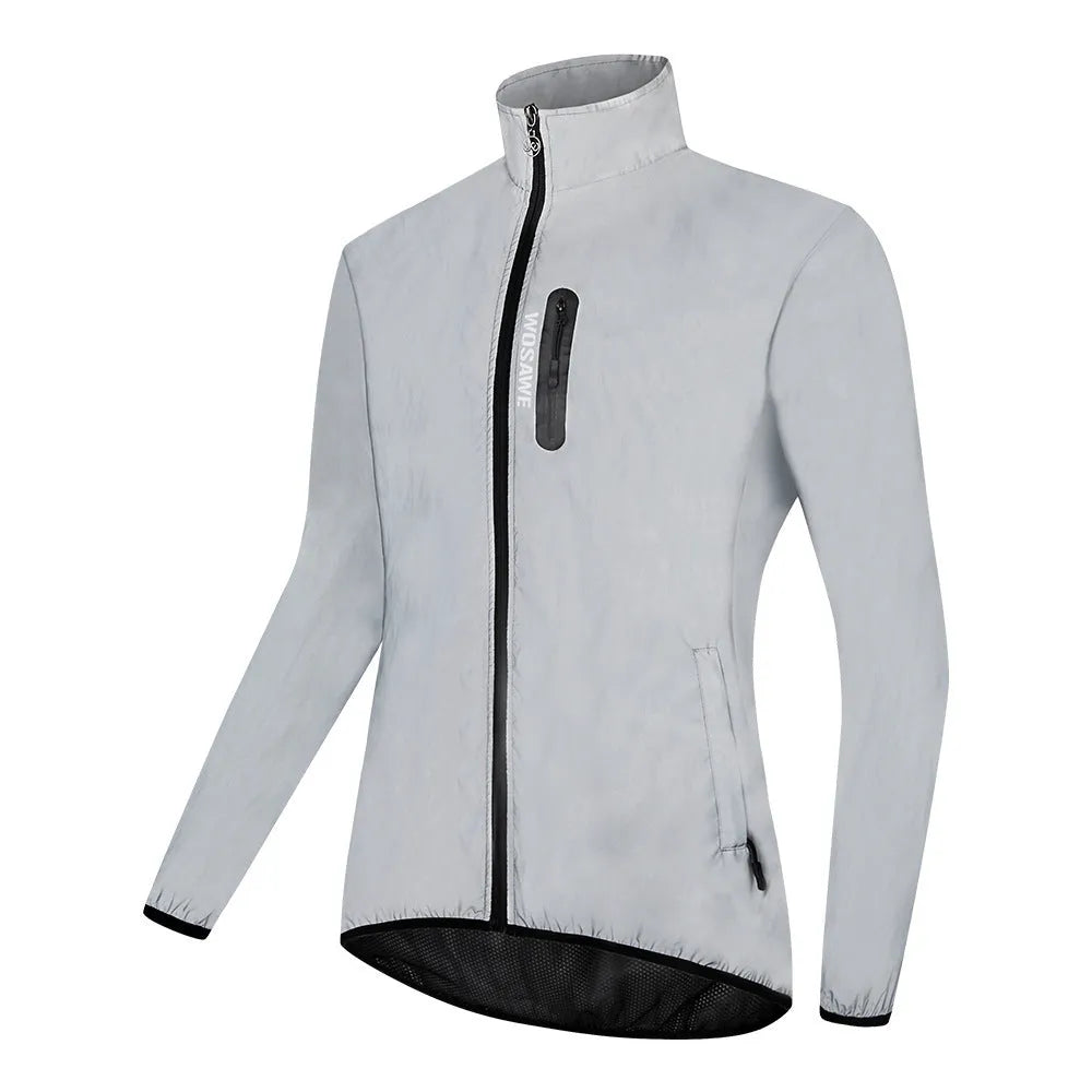 Silver waterproof polyester long sleeved top shown on a hanger.