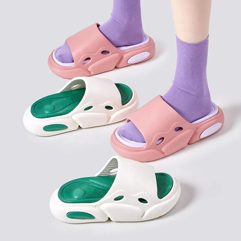 Two-colour EVA slippers for couples with thick sole, shown in pink and purple colour option.