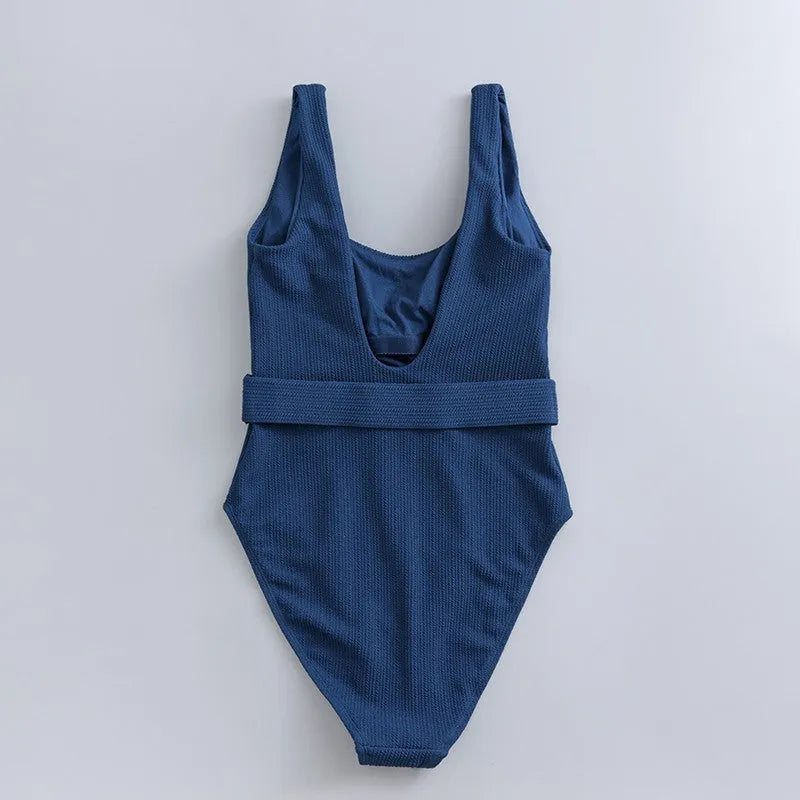 Navy blue women's one-piece slimming triangle swimsuit with a removable chest pad.