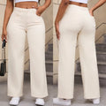 Women's high-waist straight leg wide jeans in apricot colour on a hanger.