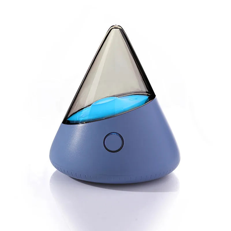 M3 small night lamp in colourful blue with geometric stereo design on a table