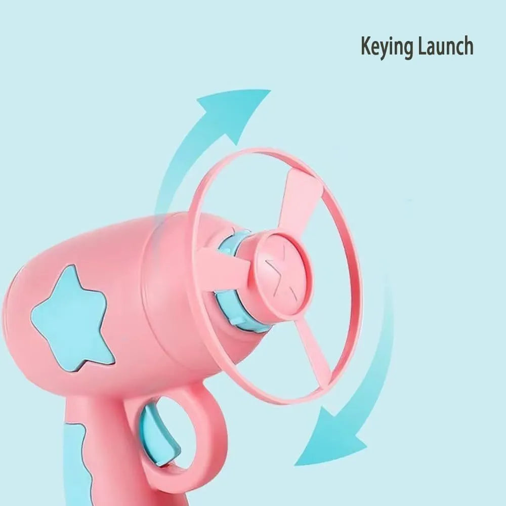 Blue and pink plastic cat toy gun with two frisbees for indoor play