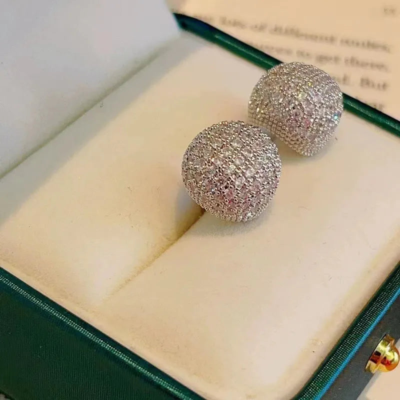 Little Golden Beans geometric drop earrings with spherical elements and diamond detailing in gold and white colours