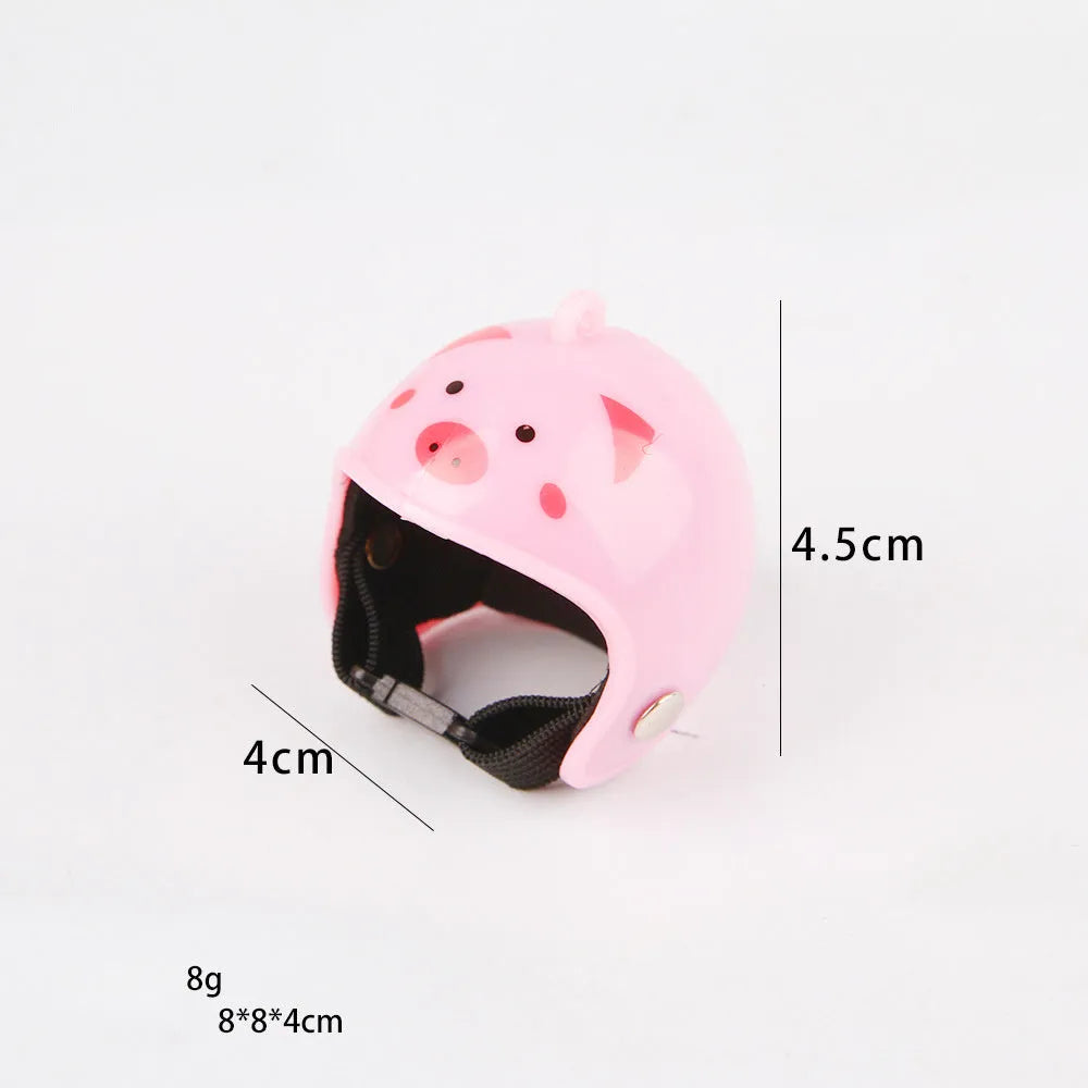 Small hard plastic pet helmet with elastic adjustment straps and sponge lining for chickens and birds