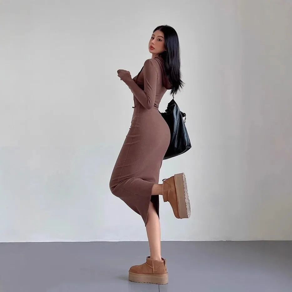 Women's grey hooded sheath dress with long sleeves and over-the-knee length in high-waist styling