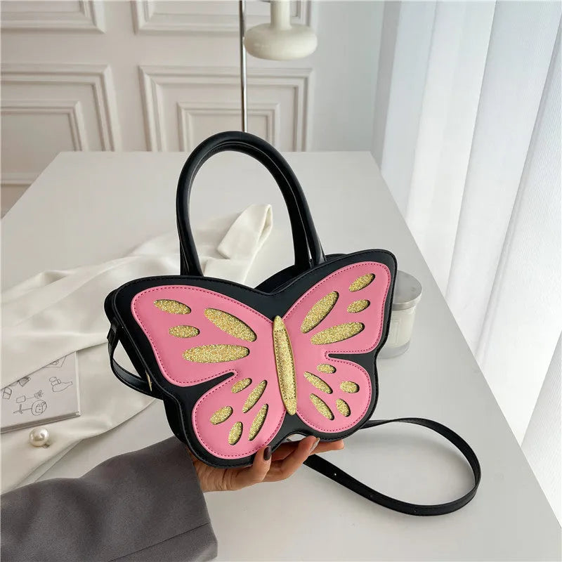 Square crossbody bag in black with contrast detailing, showing shoulder strap and dimensions