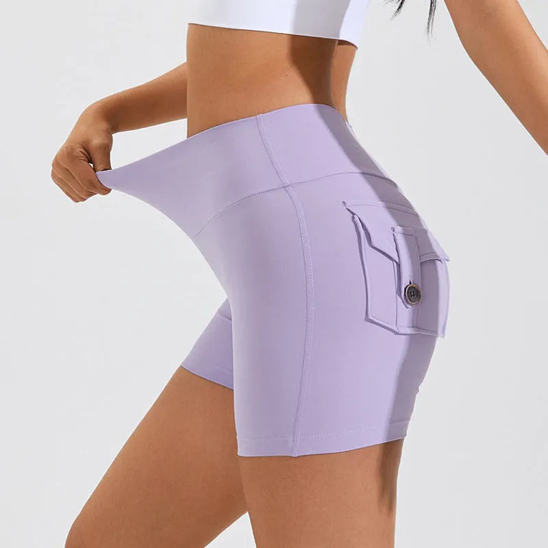 Women's high waist hip lifting sports shorts with side pockets in electric blue colour