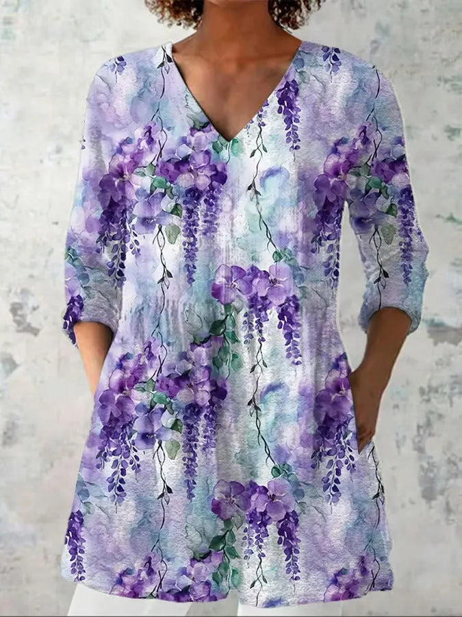 Women's slim-fit long-sleeved retro top with a digital print design on polyester fabric.