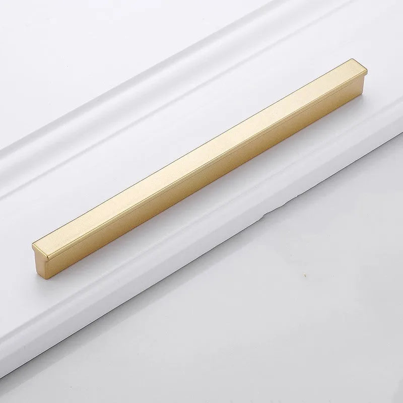 Modern gold aluminium alloy single-hole cabinet handle with T-shape design.