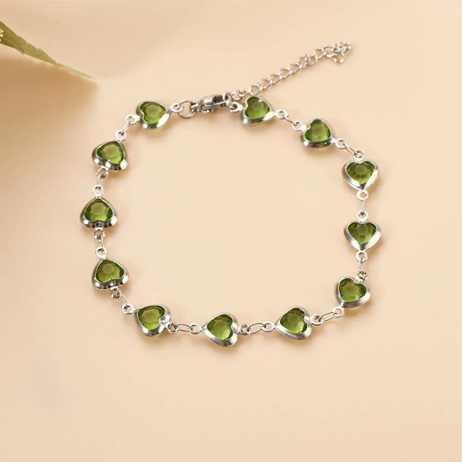 Devil's Eye geometric heart bracelet in stainless steel showing six colour options on white background