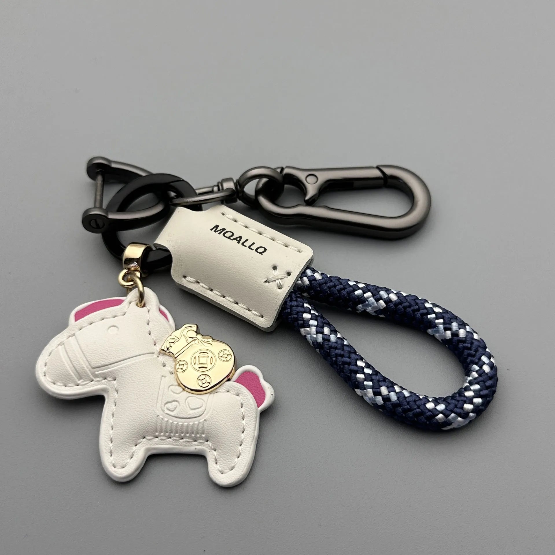 Handmade brown cowhide leather car key ring pendant with a zinc alloy belt buckle and green flanelle rope.
