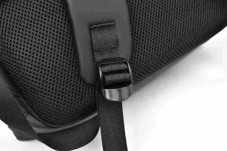 Waterproof laptop backpack in black showing large main compartment and simple design with sewing thread detailing