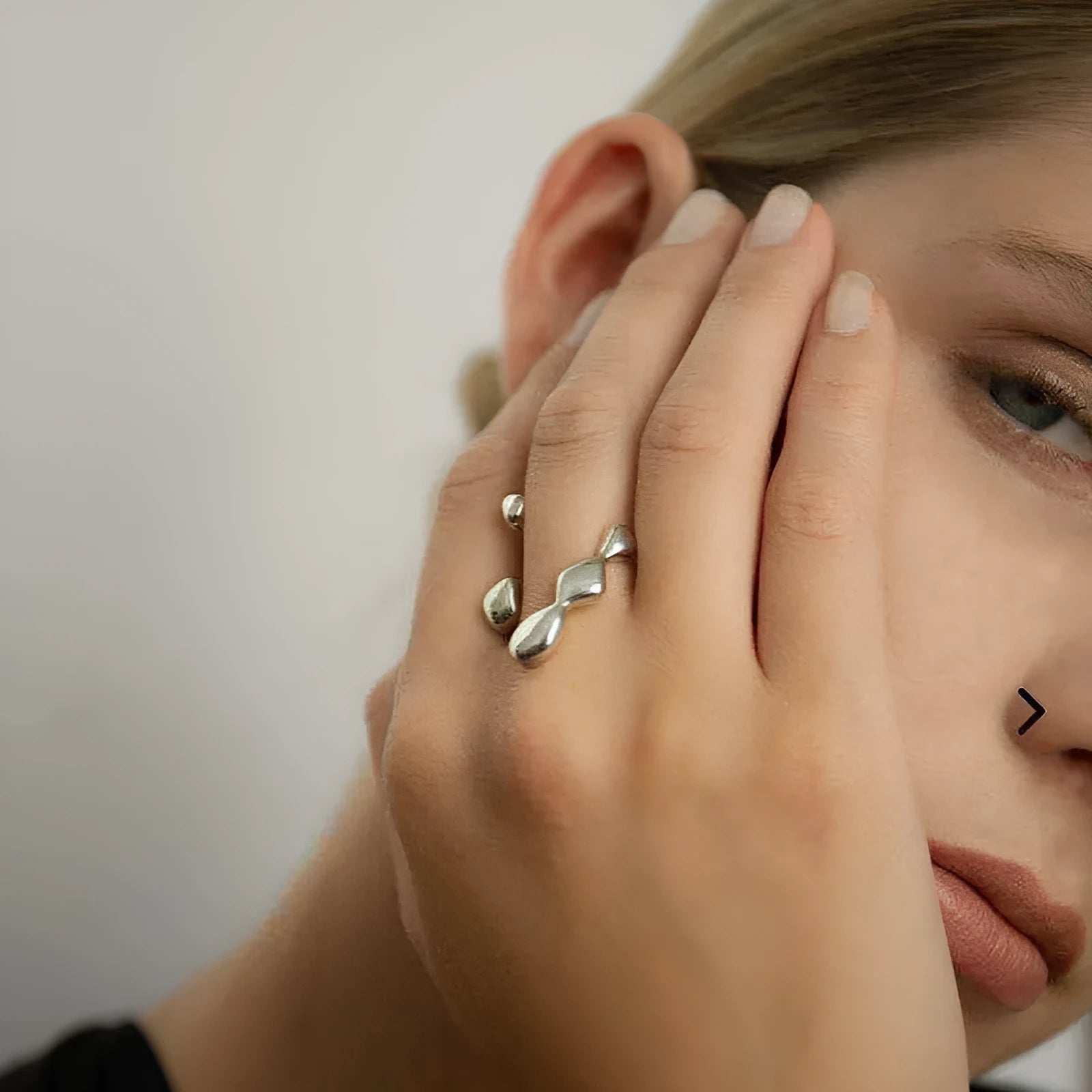 Women's brass opening ring with gold finish and circle sphere design