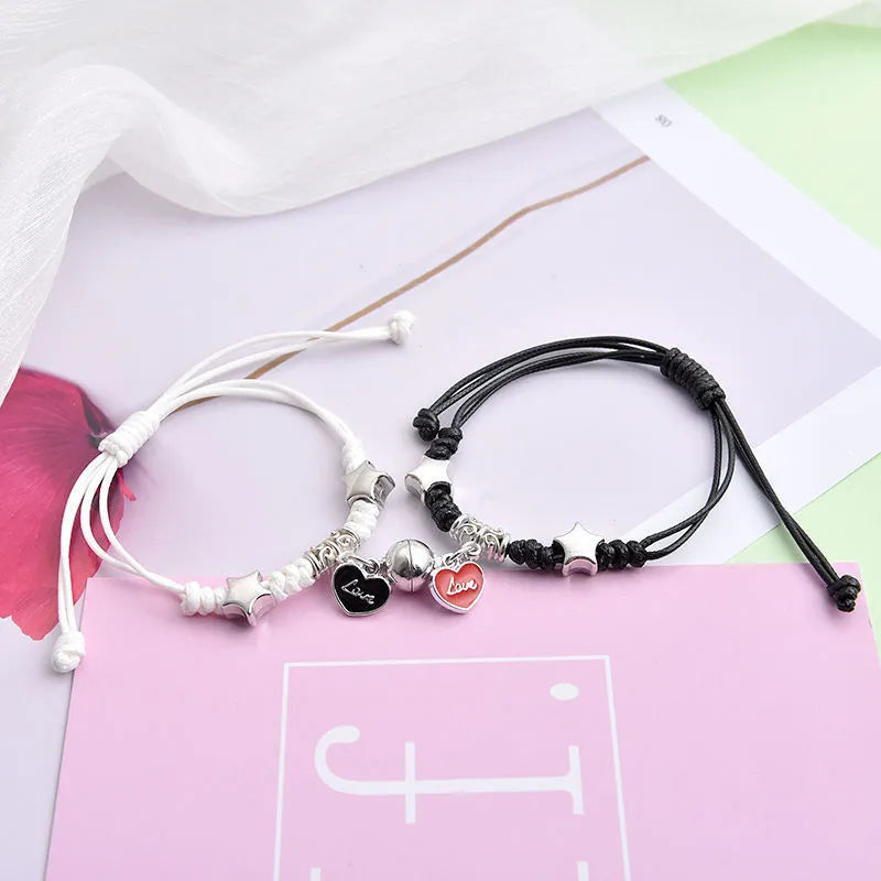 Magnetic couple bracelets with crown and diamond designs in alloy electroplated construction