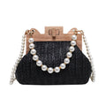 Women's straw woven shoulder bag with pearl chain detail showing internal organisation compartments
