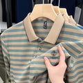 Men's red striped short sleeve t-shirt with mosaic pattern detail on a mannequin.