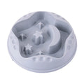 Moon Star Wings ceramic dog slow feeder bowl with raised centre ring and non-slip base in blue, grey, green, pink, or yellow.