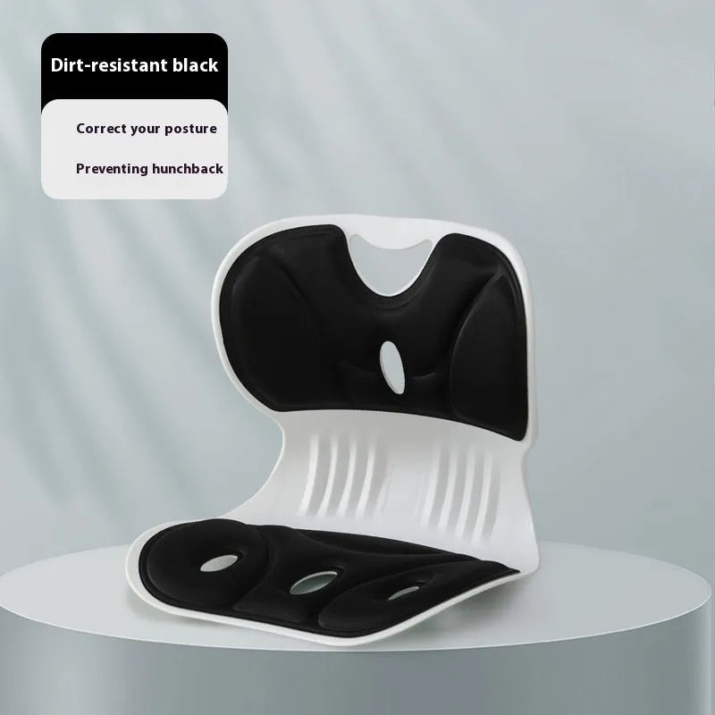 Memory foam backrest cushion with a securing strap shown in a grey colour on a chair.