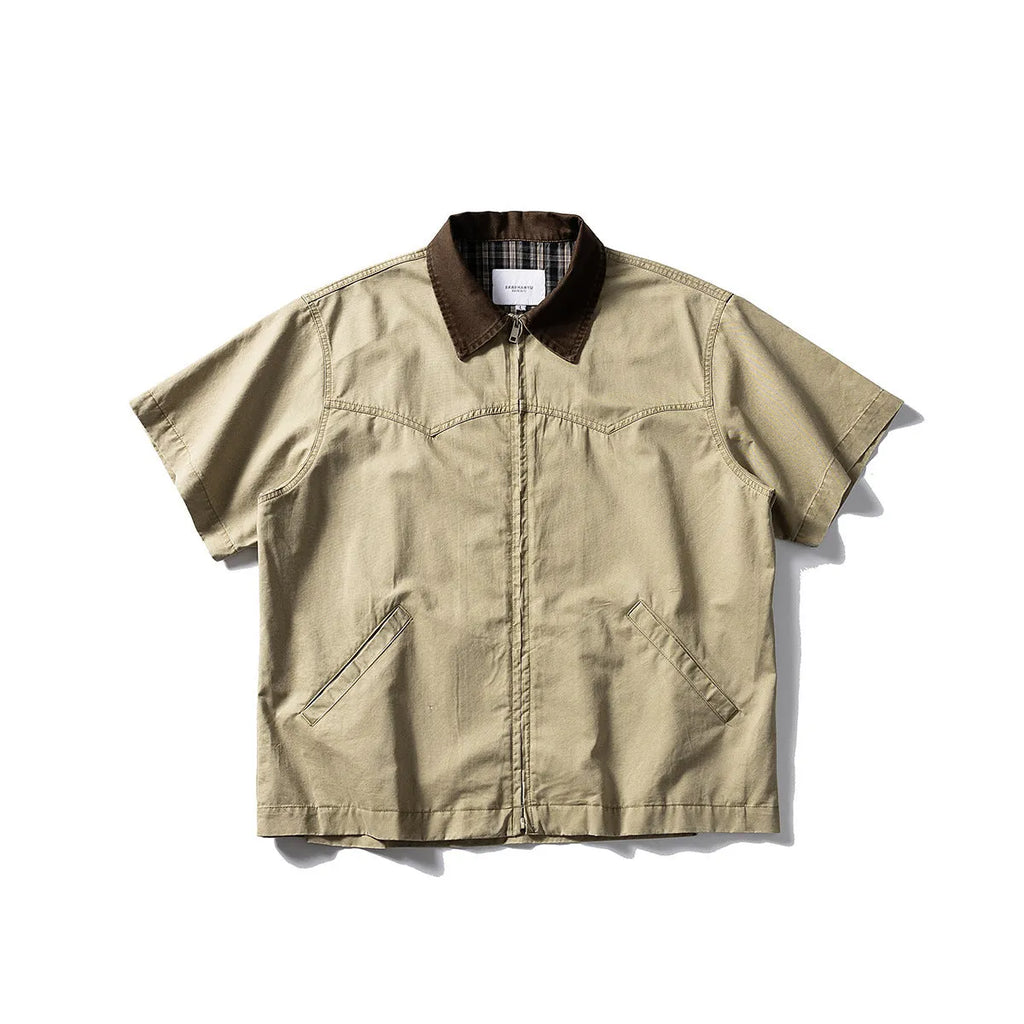 Khaki washed cotton short sleeve overalls shirt loose fit on hanger