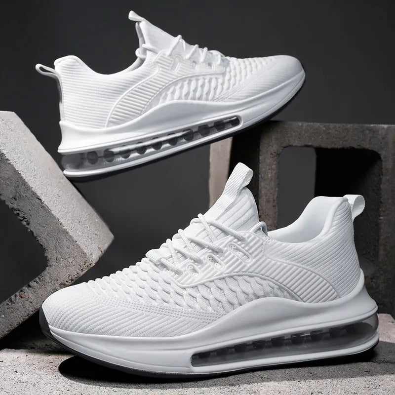 Men's black low-top mesh running shoes with round toe and lace-up front on a white background.