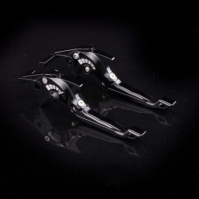 Pair of anodised metal motorcycle horn handle clutch levers with six-speed adjustable length, shown in a selection of colour finishes