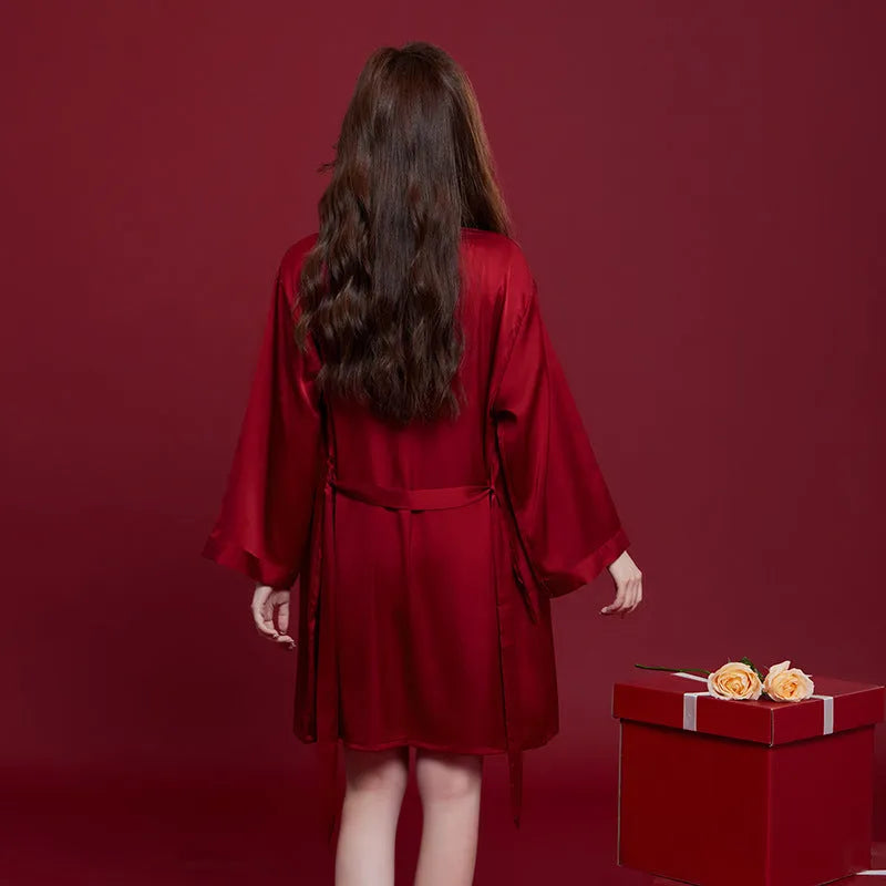 Red long sleeve polyester pyjama set for men and women on hangers