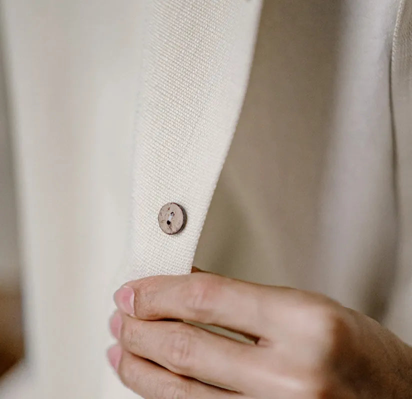 Light apricot men's shirt with a bamboo and floral pattern and a Cuban collar.