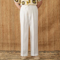 Straight-leg linen trousers with elasticated high waistband in navy blue, white, and greige colours