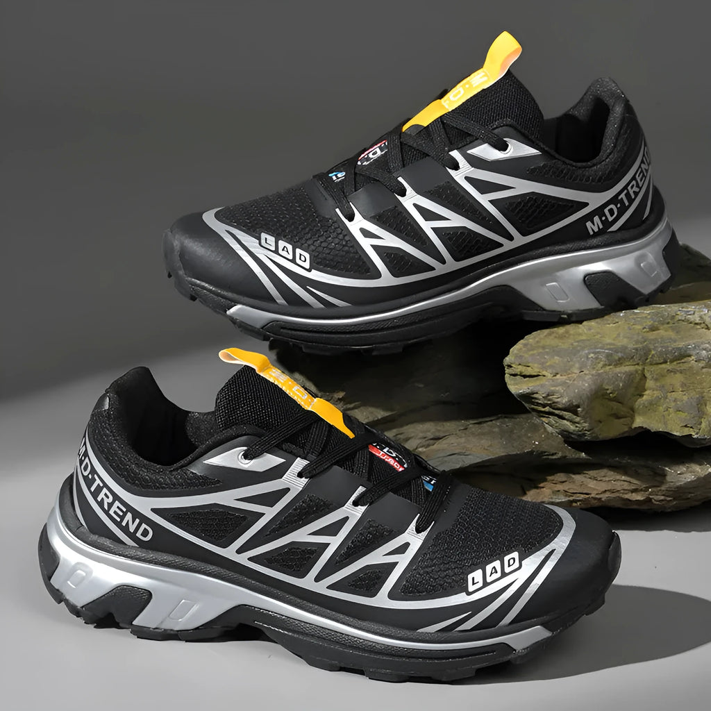 Men's and women's low top hiking shoes with artificial leather upper and rubber sole in black silver and khaki colors for outdoor tourism