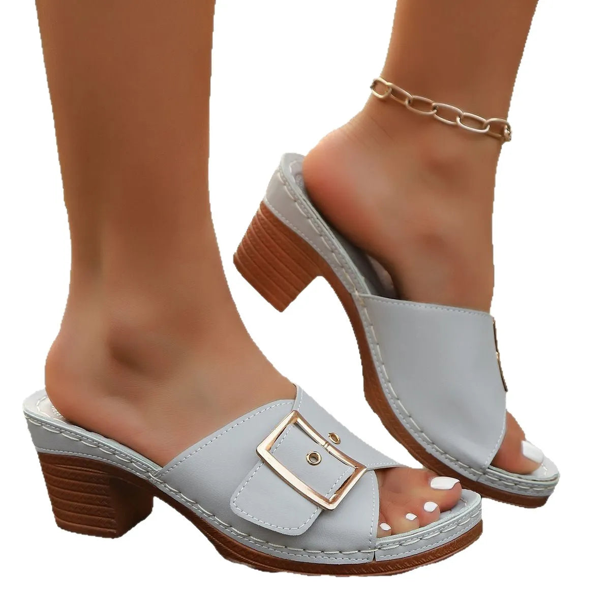 Women's black chunky heel slippers with metal buckle detail and round toe