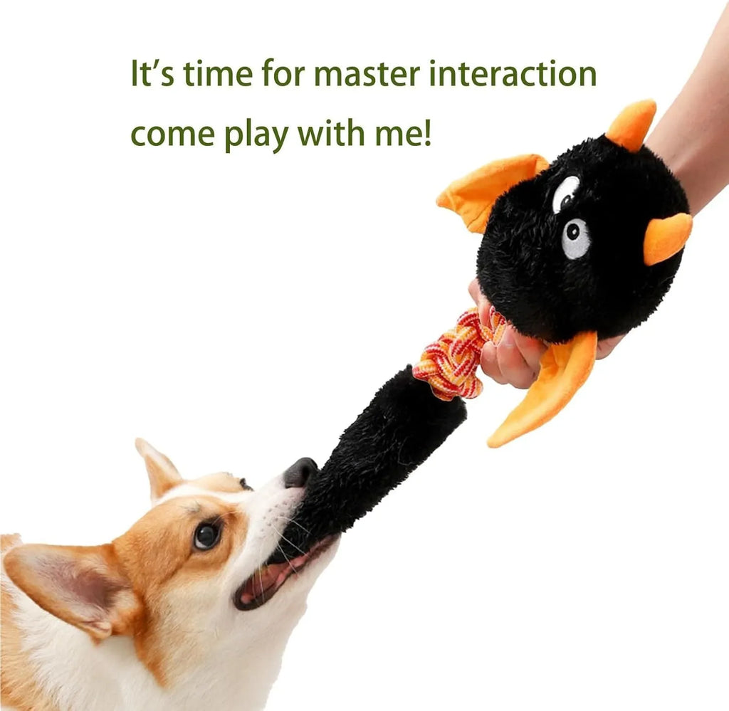 Large plush dog toy in red with cartoon design, featuring a rope knot and suitable for aggressive chewers