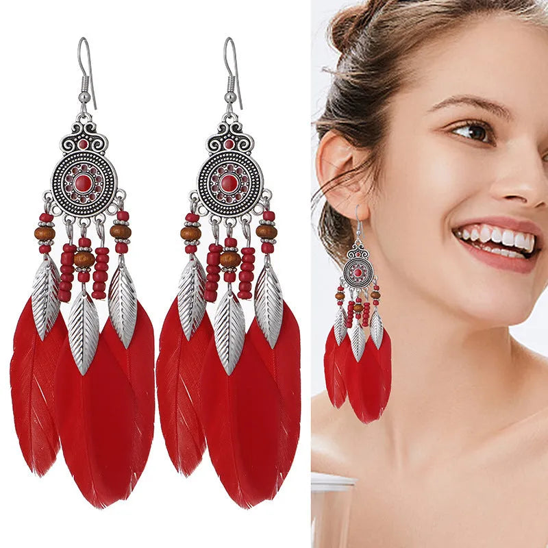 Feather pattern drop earrings with round oil craft design in alloy with electroplated finish
