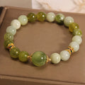 Women's bracelet made of green Xiuyan jade in a light luxury sweet Mori style design.