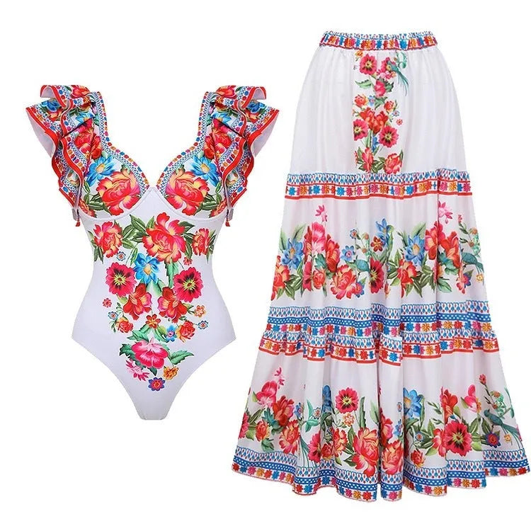 Women's printed one-piece swimsuit with a matching skirt cover-up in a rose pink floral pattern.