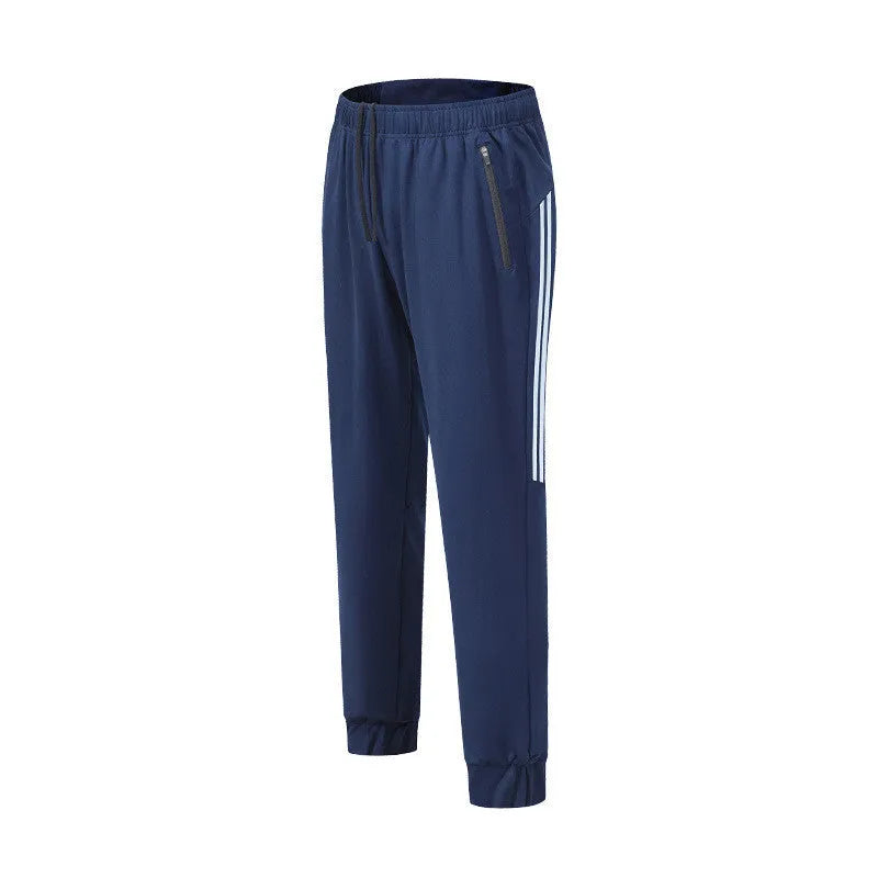 Men's black running trousers with mid waist and full length polyester construction for exercise