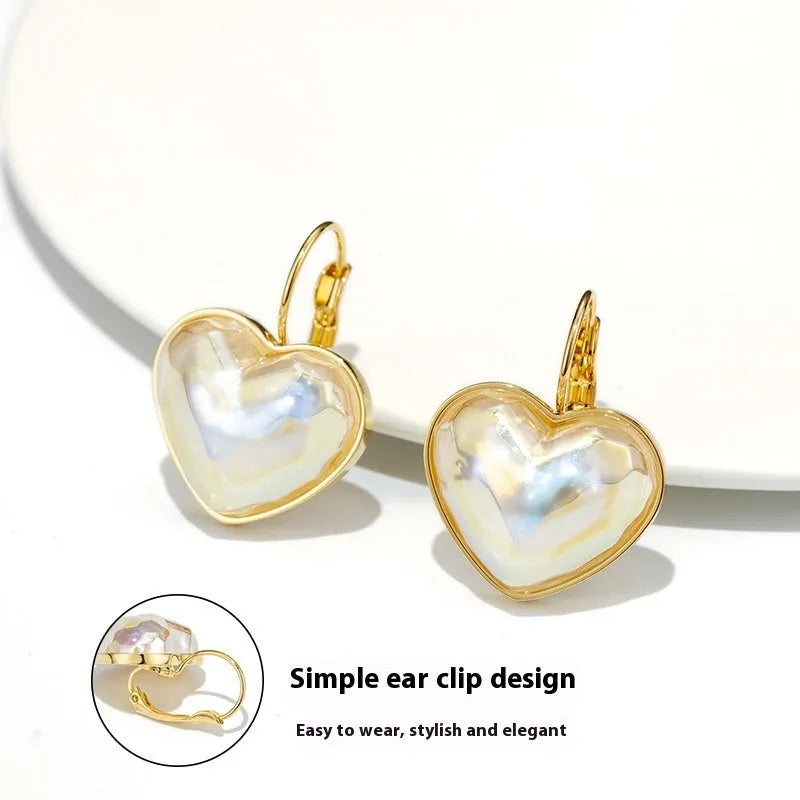 Gold tone alloy ear clips for women with clip-on design and natural styling