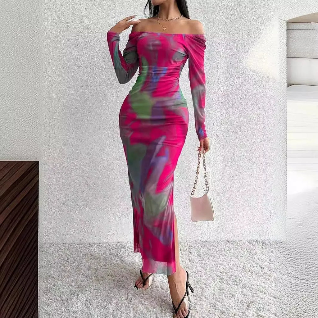 Long green mesh fishtail evening dress with a square collar, pleats, and a side split.