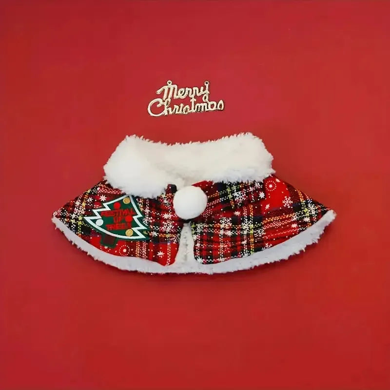 Red holiday pet scarf with bell motif wrapped around dog's neck for Christmas