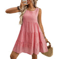 Women's light blue sleeveless plaid dress with an oversized swing skirt and high waist.