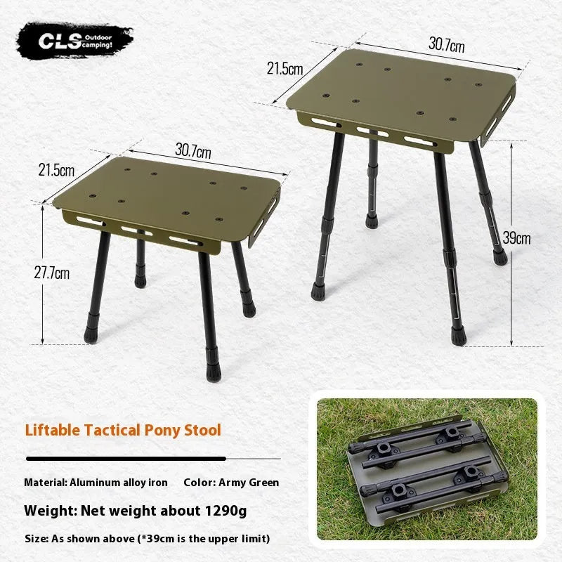 Aluminium folding camping stool that converts into a small table, shown with a tactical storage bag and a beige PU cushion.