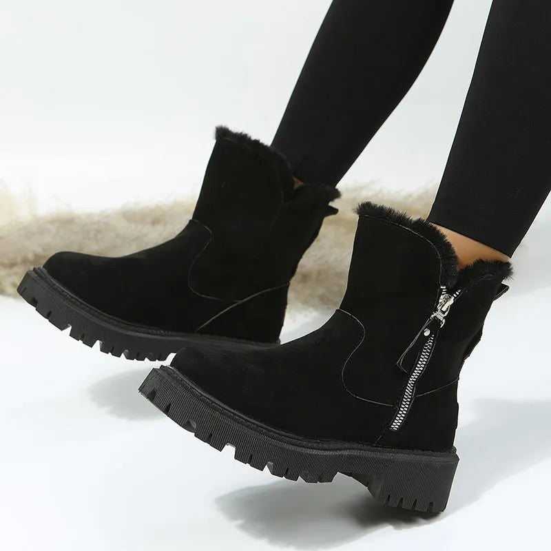 Black women's high-top snow boots with side zipper, faux suede upper, and non-slip rubber sole.
