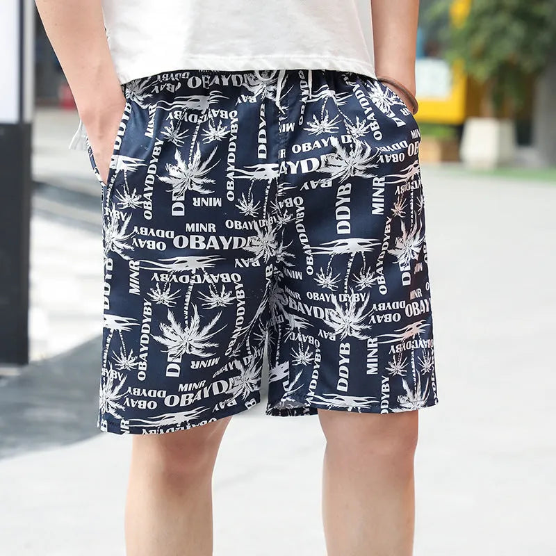 Men's floral printed swimming trunks with five-point design in quick-dry polyester material