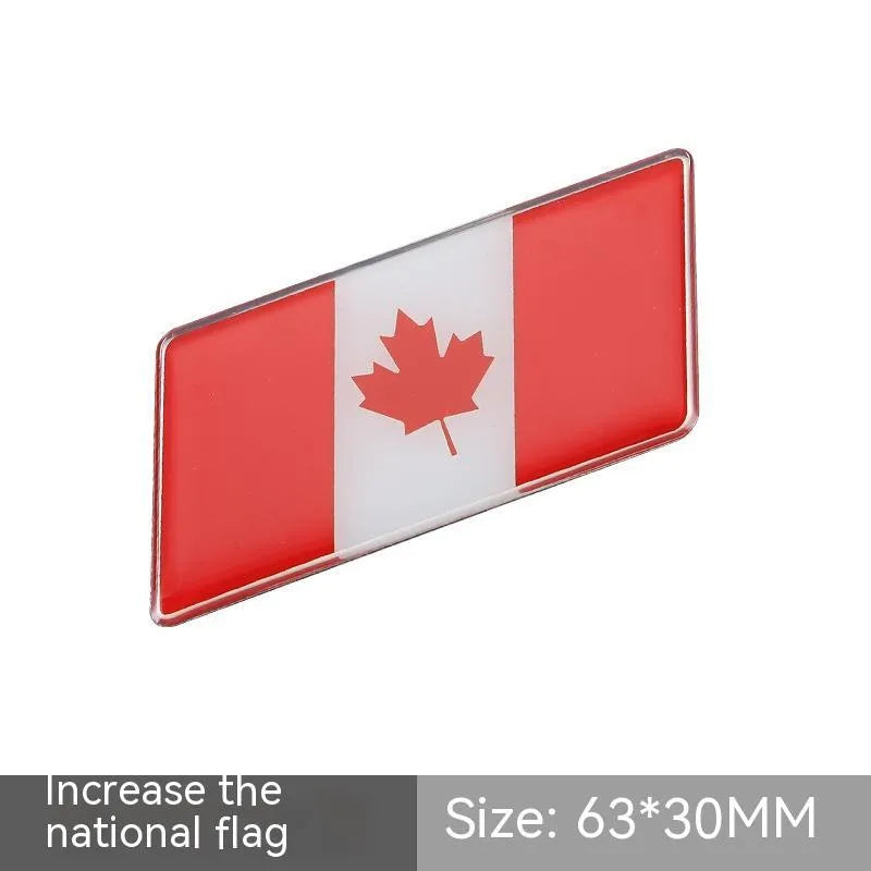 Aluminium metal car sticker with national flag design in a parallelogram shape.
