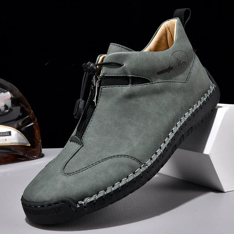 Men's green casual leather shoes with a round pointed toe and a mid-heel for height increase.